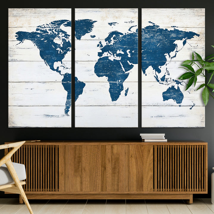 Rustic world map with blue continents on distressed wooden planks, perfect for coastal, explorer, or vintage-style wall decor.