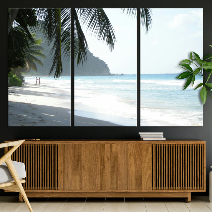 Tropical beach with palm tree shadows, white sand, and turquoise ocean waves, creating a serene and relaxing island escape atmosphere.