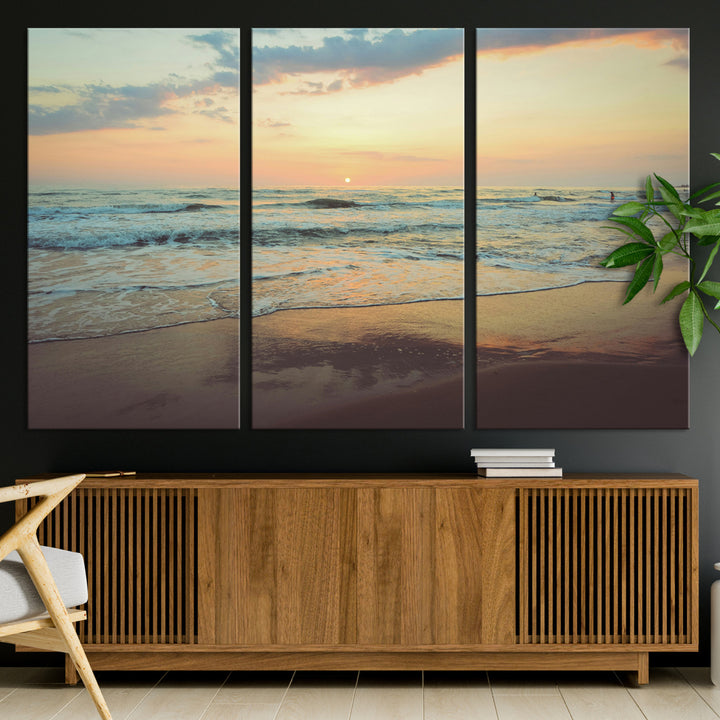 Warm sunset over gentle ocean waves with pastel sky and reflections on wet sand, creating a calm and soothing beach ambiance.