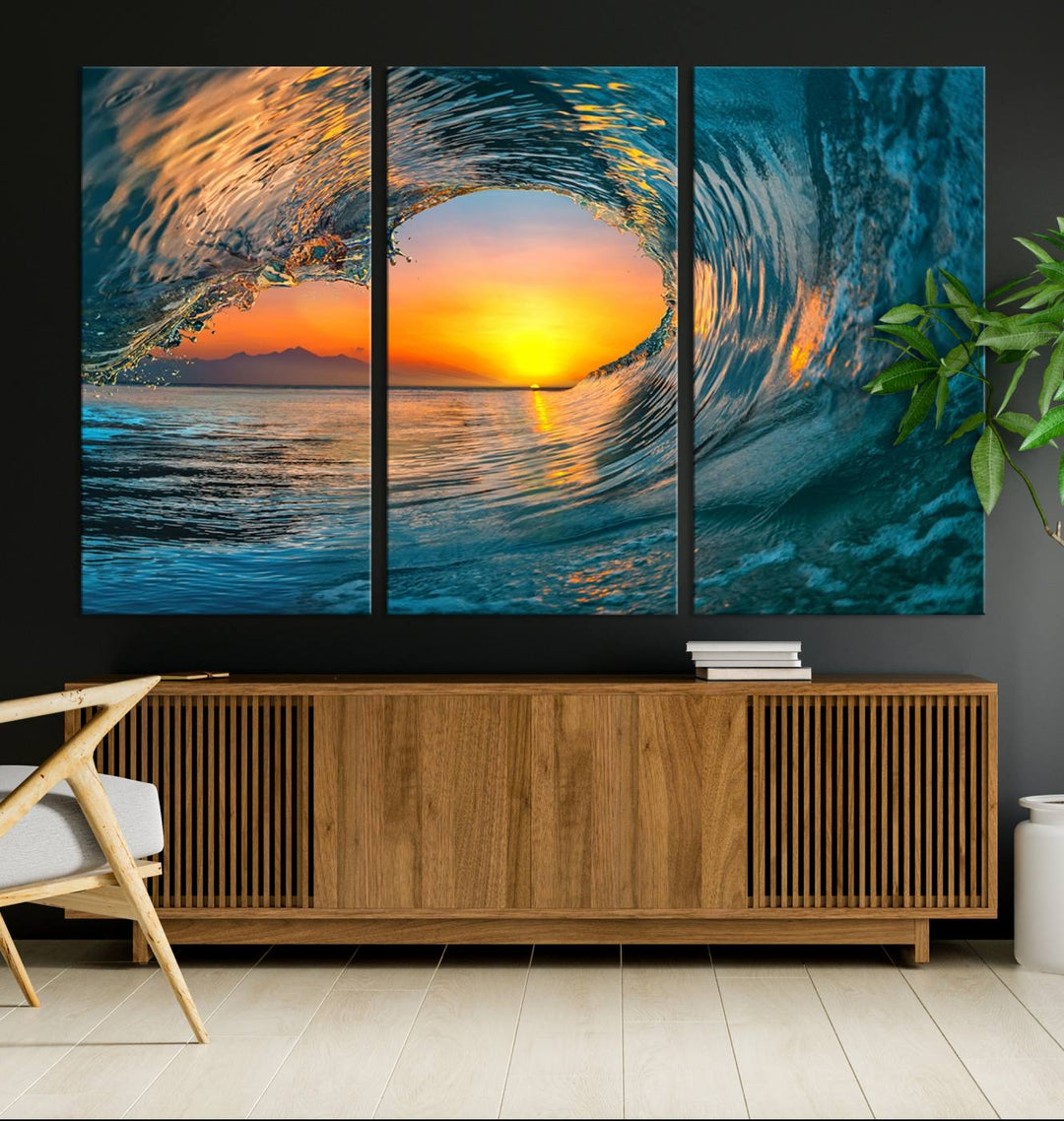 The Ocean Wave Sunset Wall Art canvas print features a vibrant ocean wave at sunset, forming a tunnel with silhouetted mountains.