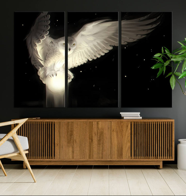 The Night Owl Art graces the wall with its depiction of a snowy owl on a glowing orb, perfect for modern decor.