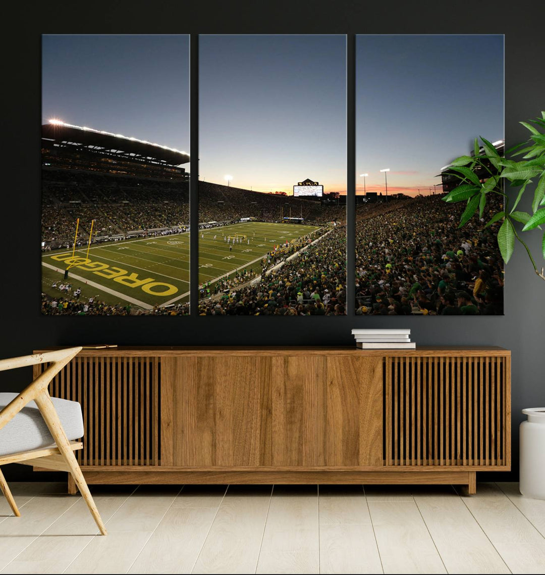 Canvas artwork depicting an Oregon Ducks football game at Autzen Stadium, capturing a sunset and packed stands.