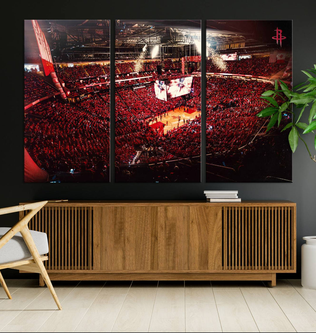 A crowded basketball arena with red lighting hosts a Houston Rockets game.