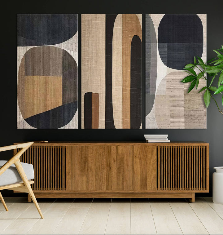 A modern dining room featuring neutral geometric boho abstract minimalist canvas art.