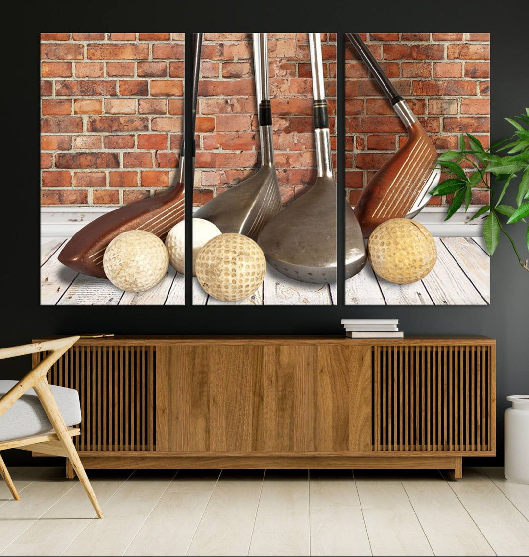 A three-panel artwork showcasing vintage golf clubs and balls adorns a brick wall in this modern room. This "Vintage Golf Club and Ball Art" is an ideal gift for golfers, bringing charm and elegance to any space, whether it's a man cave or office. It's ready to hang and framed for added convenience.