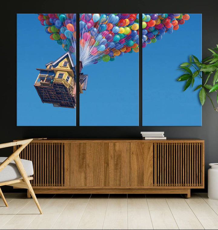 The "Carl Fredricksen, Up Movie Wall Art" features a three-panel design with a house lifted by colorful balloons, adding whimsical decor to any space.