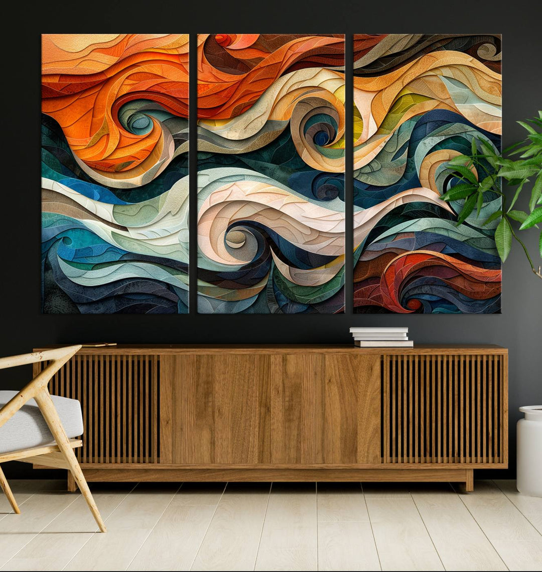 Abstract Wave Wall Art is a ready-to-hang framed canvas print featuring swirling orange, blue, and white patterns. It's perfect for adding vibrant decor to modern spaces.