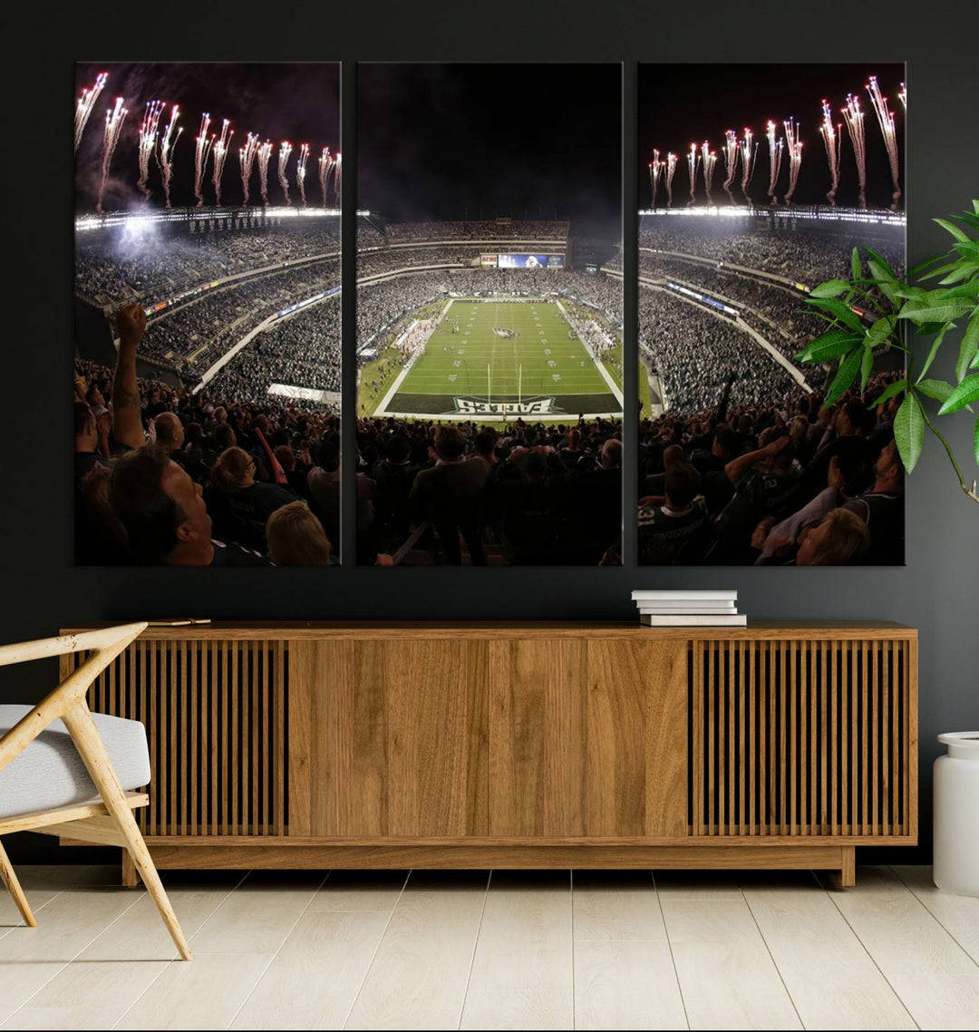 The living room features a spectacular Philadelphia Eagles Football Team Print. This wall art canvas print of Lincoln Financial Field at night captures a Philadelphia Eagles game under the dazzling brilliance of fireworks, making it an eye-catching centerpiece.