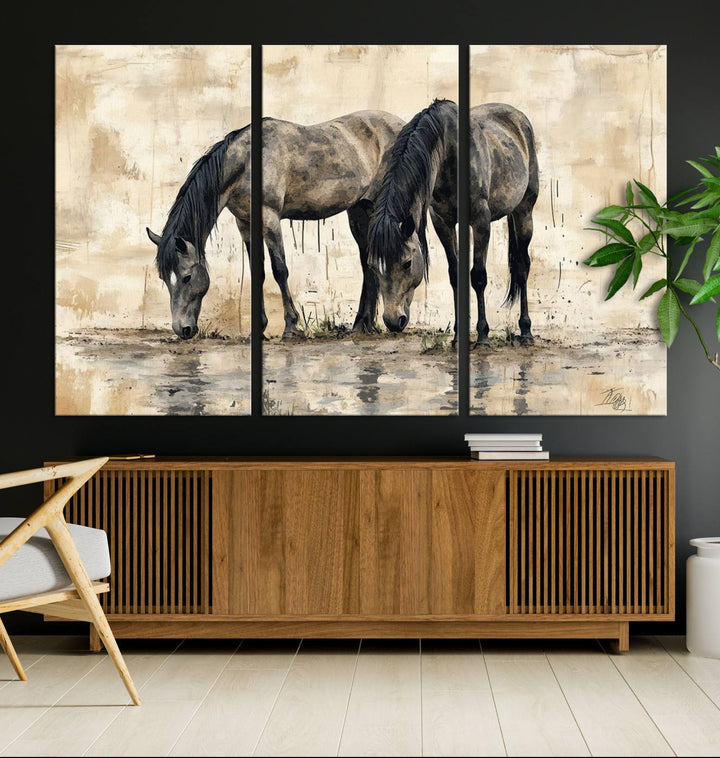 Chines Ink Style Black Horses Wall Art Canvas Print features a triptych painting of two horses drinking at the water's edge.