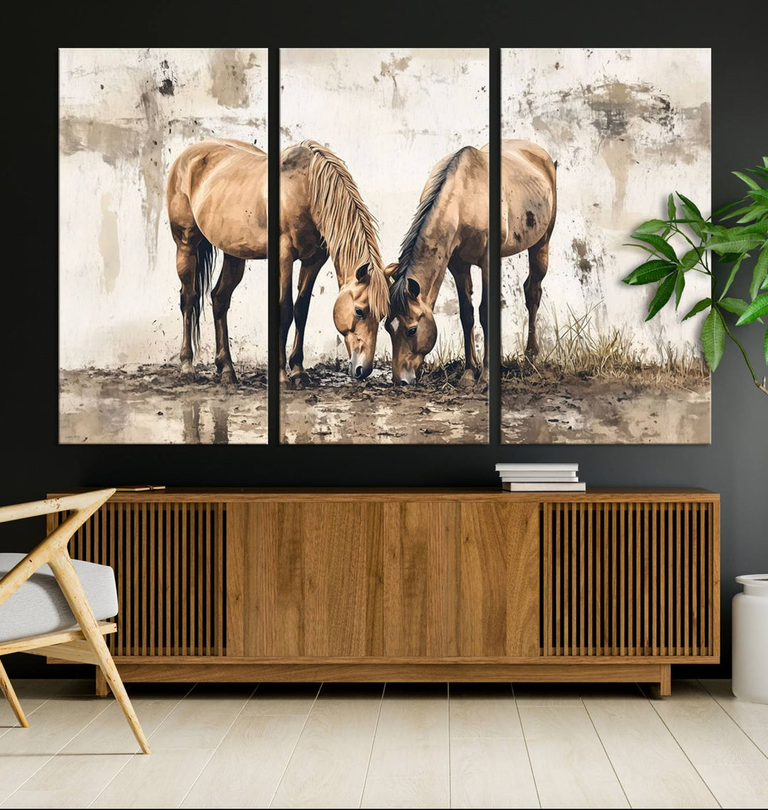 The Vintage Horses Wall Art, a ready-to-hang and framed triptych, beautifully captures two horses gracefully grazing. It perfectly complements the rustic charm of western farmhouse wall decor.