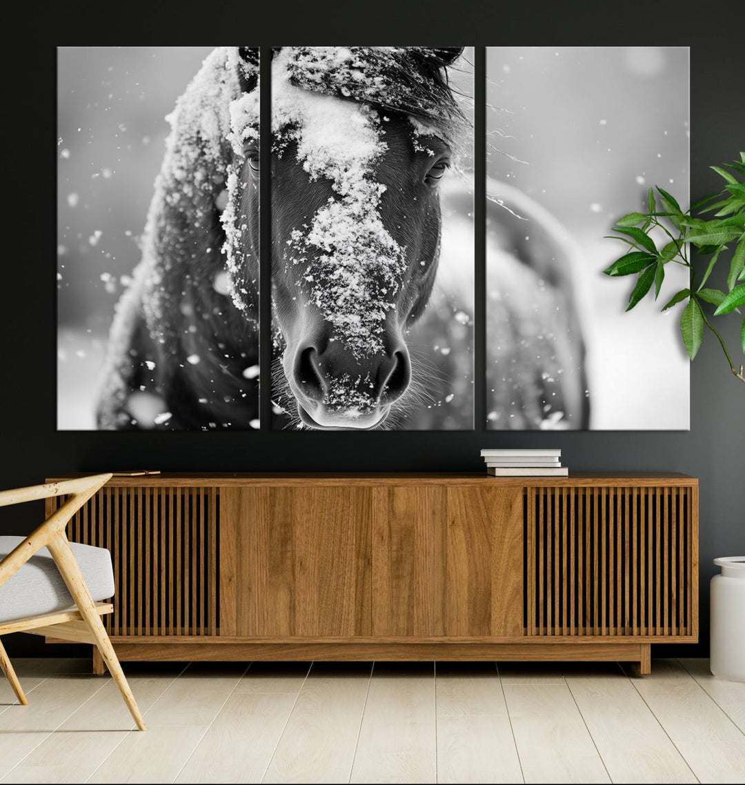 The minimalist living room features the "Black and White Horse Winter Wall Art," a ready-to-hang triptych that adds an elegant touch. This framed artwork infuses the space with a serene farmhouse decor vibe.