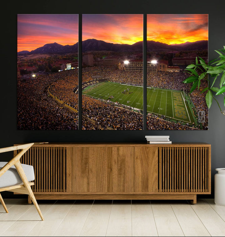 The living room showcases a lively wall art canvas print titled "Folsom Field - University of Colorado Buffaloes Football Stadium," capturing the essence of the University of Colorado.