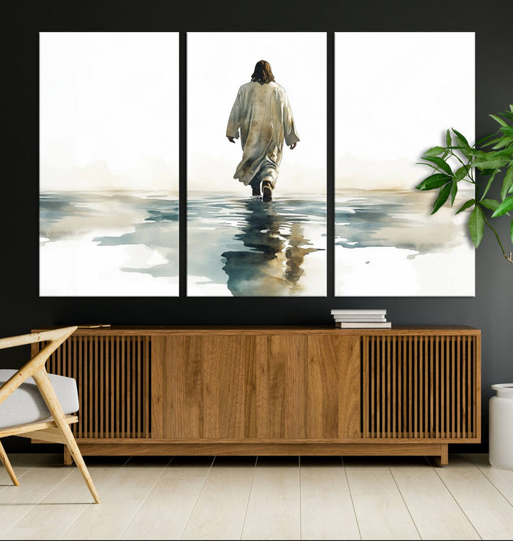 The "Watercolor Jesus Walking on Water Canvas Print" is a breathtaking piece of religious home decor that captures Jesus walking on water in beautiful detail. This Christian wall art hangs gracefully, showcasing its artistic beauty.