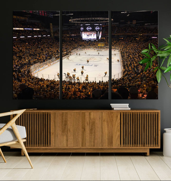 A captivating triptych canvas print, titled "Bridgestone Arena - Nashville Predators Hockey Team Print," adorns the wall. This Nashville wall art canvas print is perfect for Predators fans who appreciate sports-themed decor.