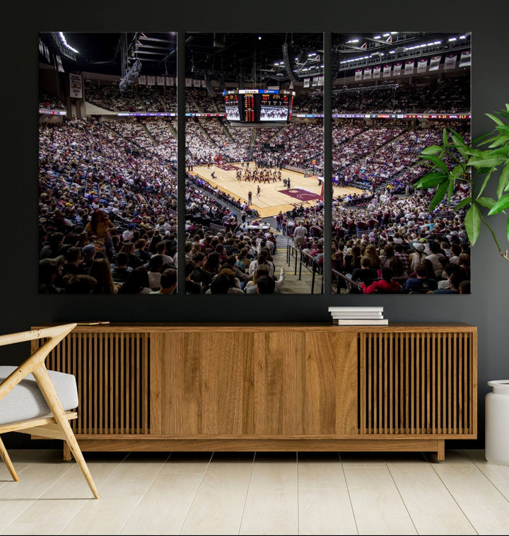 The Nebraska Basketball Arena Wall Art Canvas features an arena filled with Cornhuskers fans and players beneath a scoreboard.