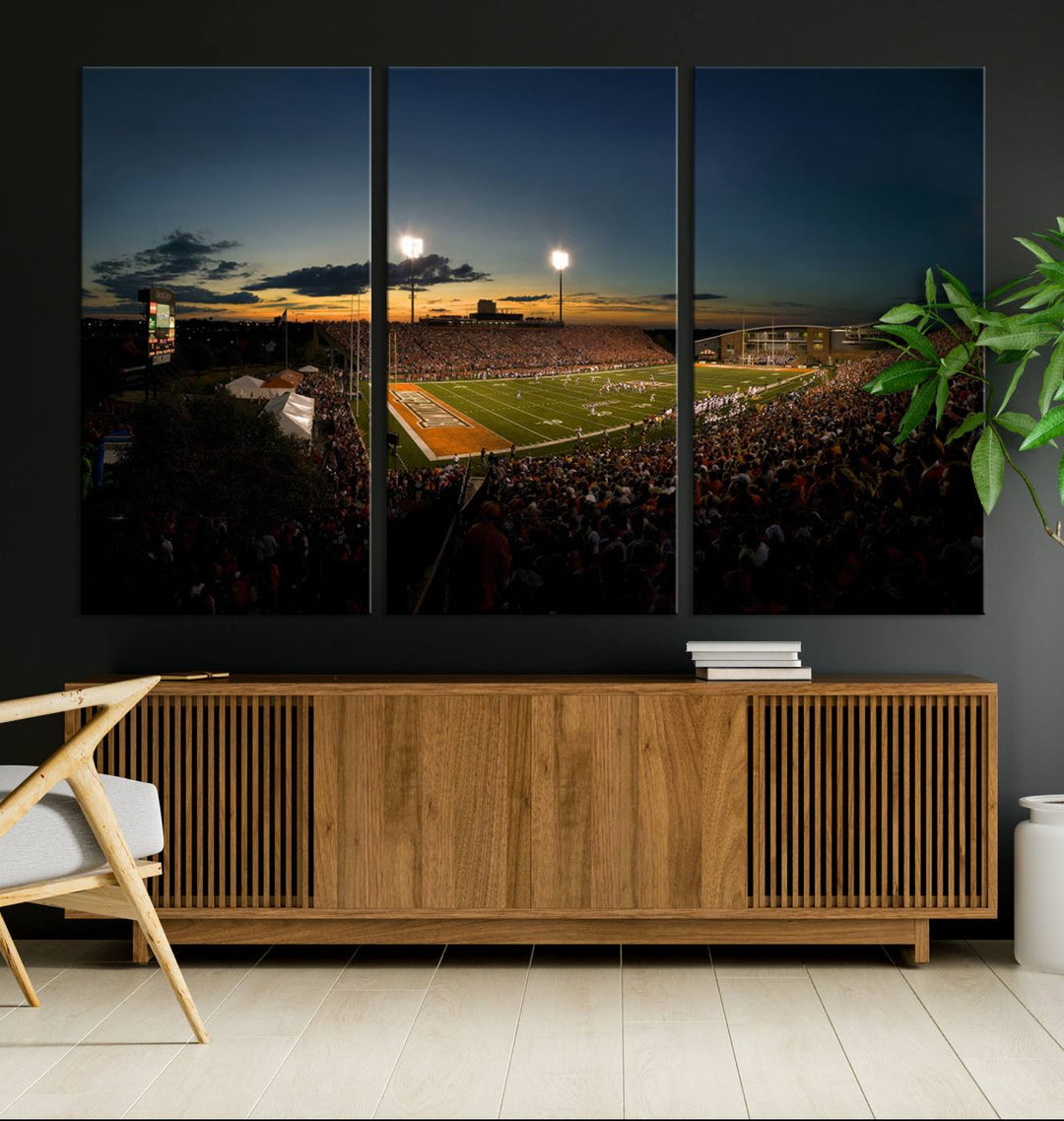 Ball State Cardinals Football Team Print - Muncie Scheumann Stadium Canvas featuring a sunset, floodlights, and lively crowd.