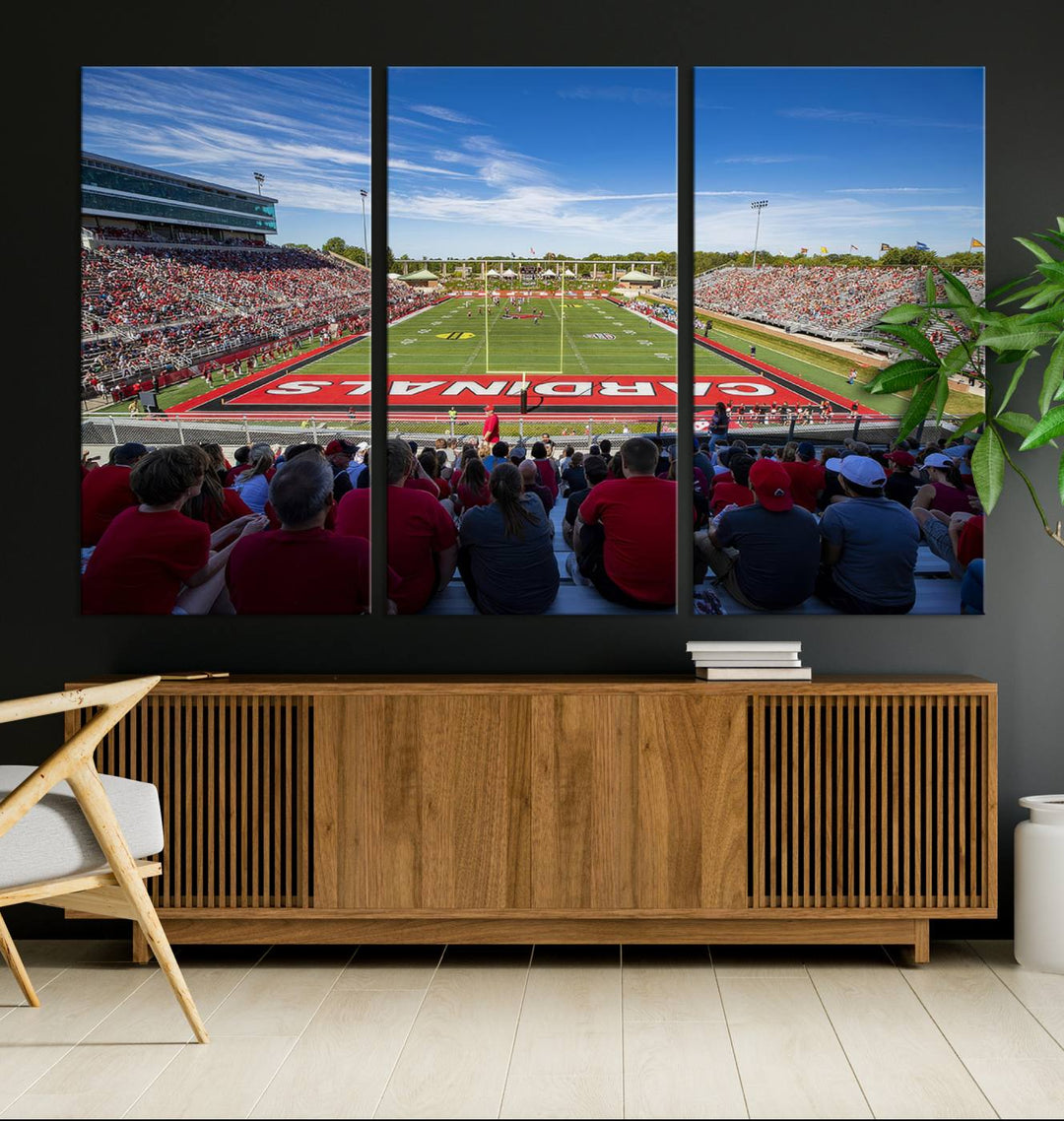 The Ball State Cardinals wall art on canvas depicts fans in red at Scheumann Stadium.