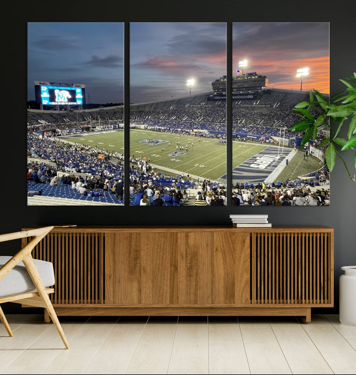 A Memphis Tigers football canvas print of Simmons Bank Liberty Stadium at sunset enhances the living room.