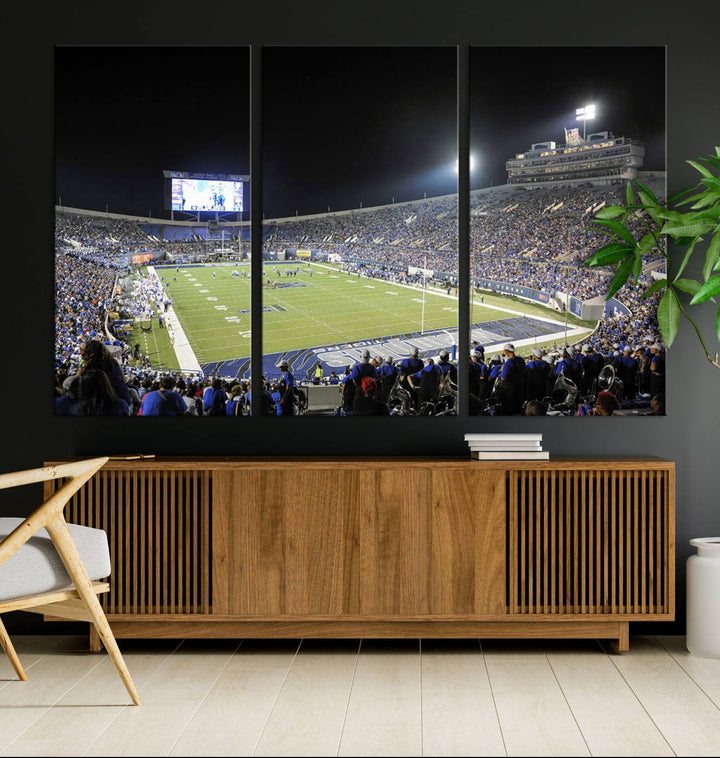 A vibrant depiction of Liberty Stadium at night, highlighting a Tigers football game on the large screen with stands filled with enthusiastic fans.