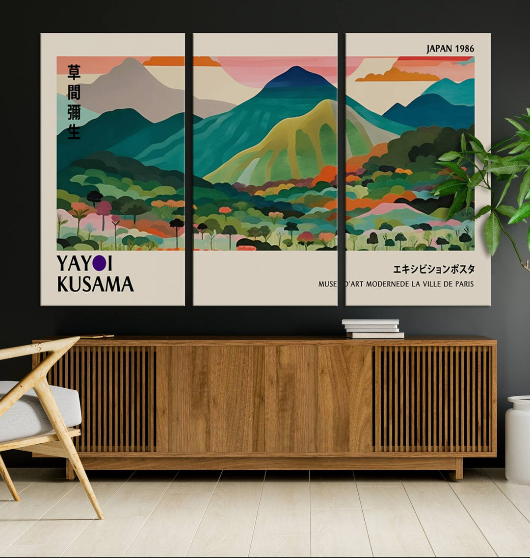 Vibrant abstract world map print featuring mountains and trees, including the text Yayoi Kusama and Japan 1986.