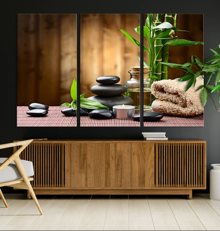 Zen Serenity Triptych Canvas Art: Pink Lotus Flower and Stones, Tranquil Water Lily Print, creating a peaceful spa ambiance.