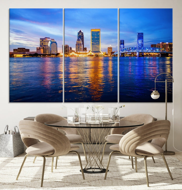 A cozy living room features the Jacksonville Wall Art Canvas Print, a large triptych crafted on museum-quality canvas that beautifully depicts the Jacksonville city skyline at sunset.