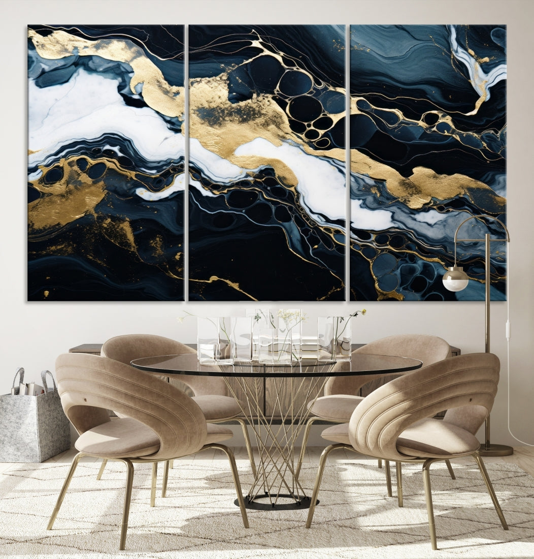 Fluid Marble Abstract Wall Art Print, a contemporary piece with black, white, and gold swirls on museum-quality canvas.