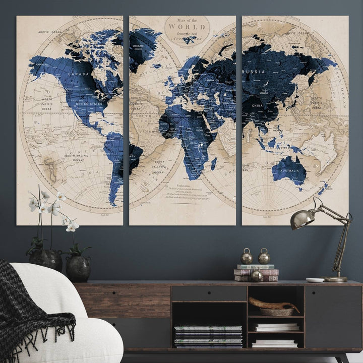 The Vintage Triptych Map Print is a grunge-stained blue and beige world map, perfect for enhancing wall decor.
