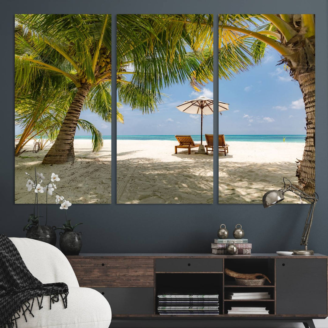 The canvas art print titled Lounge Chairs Palm Trees on Tropical Beach offers free shipping.