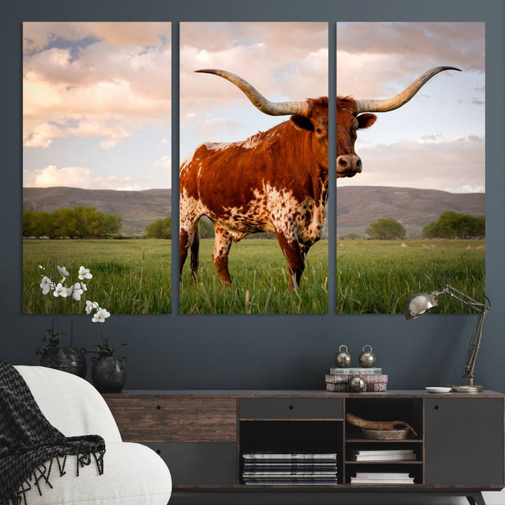 The Texas Cow Canvas Wall Art print captures a longhorn cow at sunset and is ready to hang.