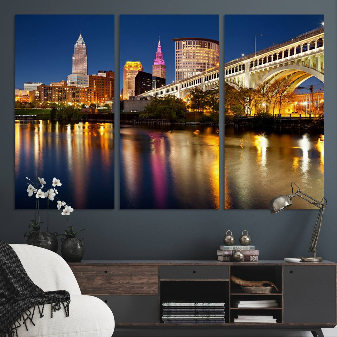 Cleveland Night Skyline Canvas: Cityscape with an illuminated bridge reflecting on calm water.