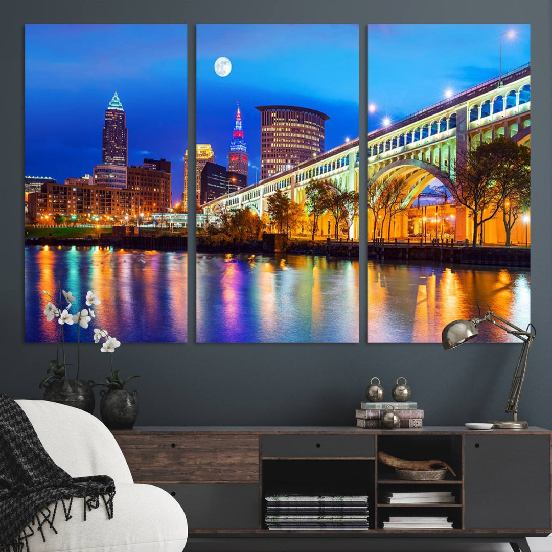 A Cleveland Night Skyline Wall Art on museum-quality canvas showcases a bridge and illuminated buildings.