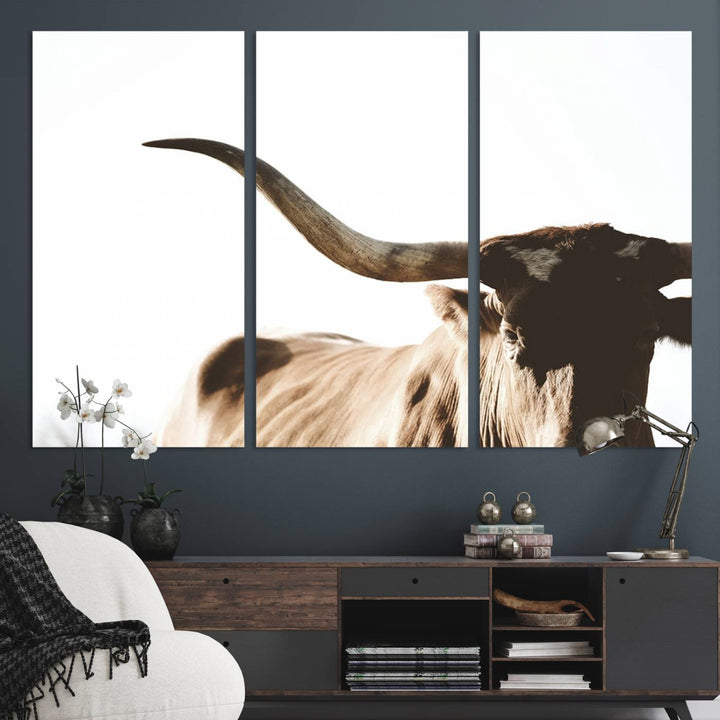 A 3-panel Texas Longhorn canvas adds a touch of rustic Western decor.