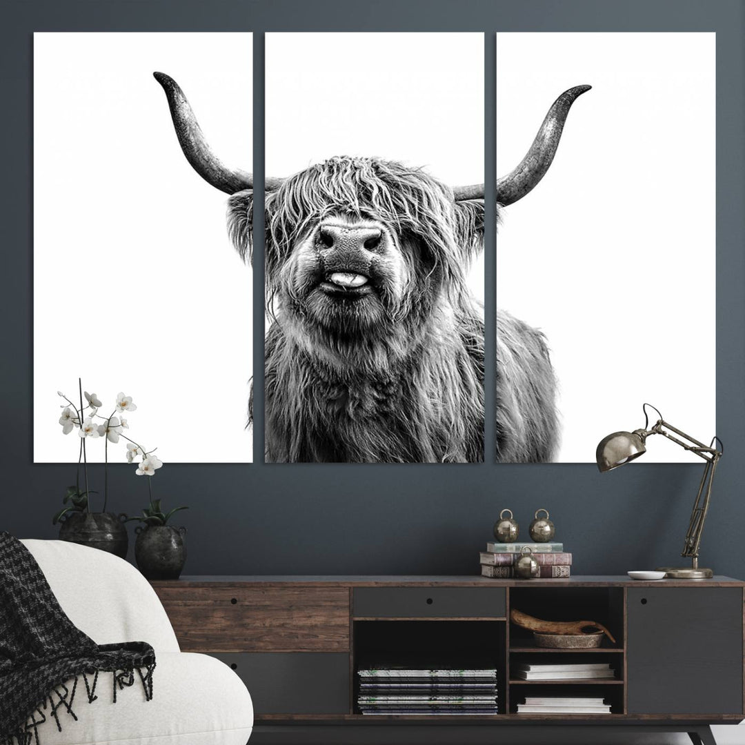 The Fanny Highland Cow art print decorates the modern kitchen, featured in black and white.