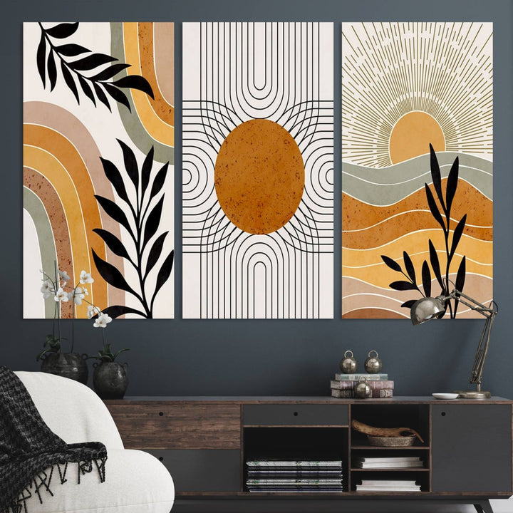 The Modern Boho Sun and Leaf giclée canvas is a 3-panel piece designed for mid-century or bohemian decor.