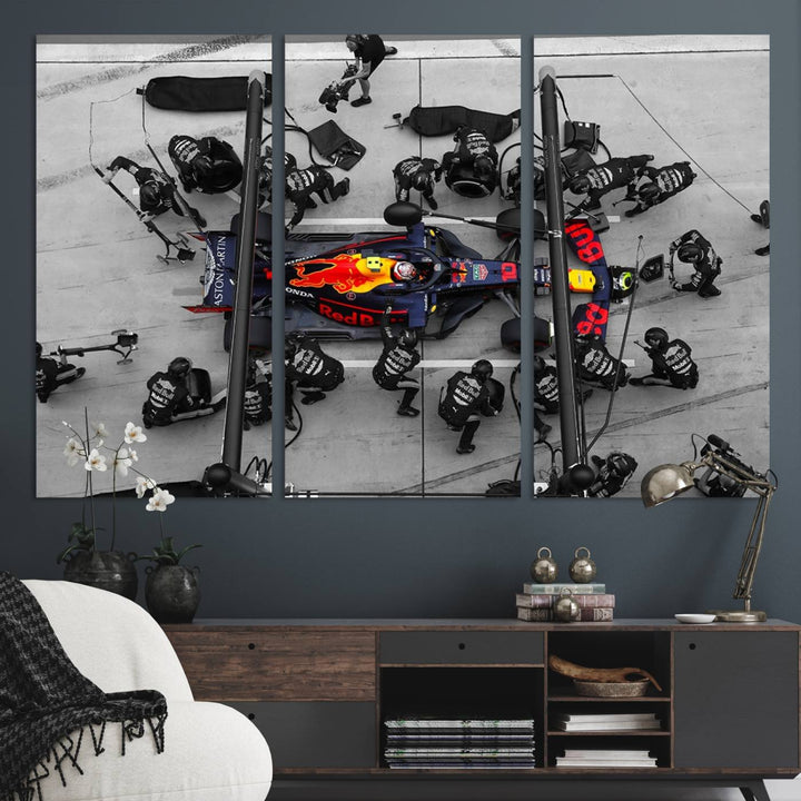 Red Bull Formula 1 Canvas Wall Art Print: An aerial view of a Formula 1 pit stop featuring a Red Bull car on premium canvas.