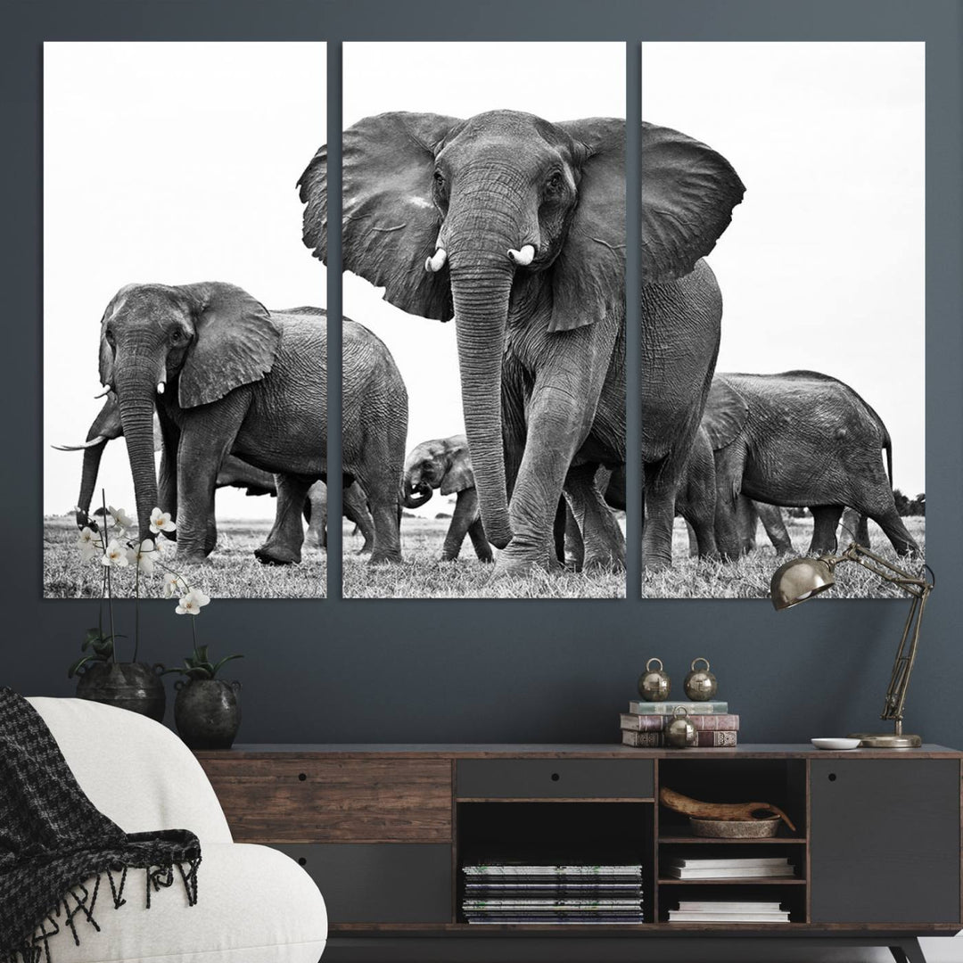 A modern dining area features a Black White Elephant Family Wall Art Canvas Print.