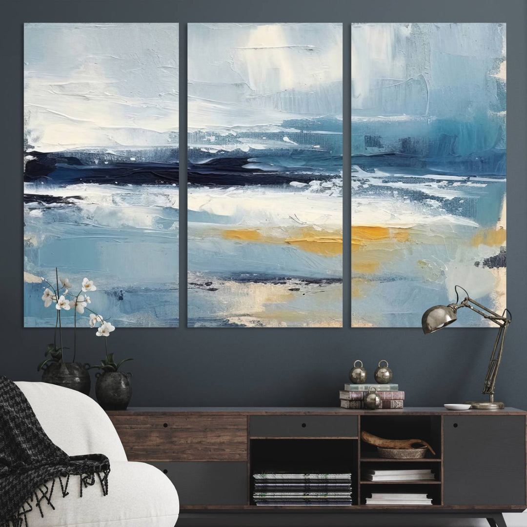 The Abstract Ocean Canvas Wall Art in coastal blue and gold enhances the modern kitchen.