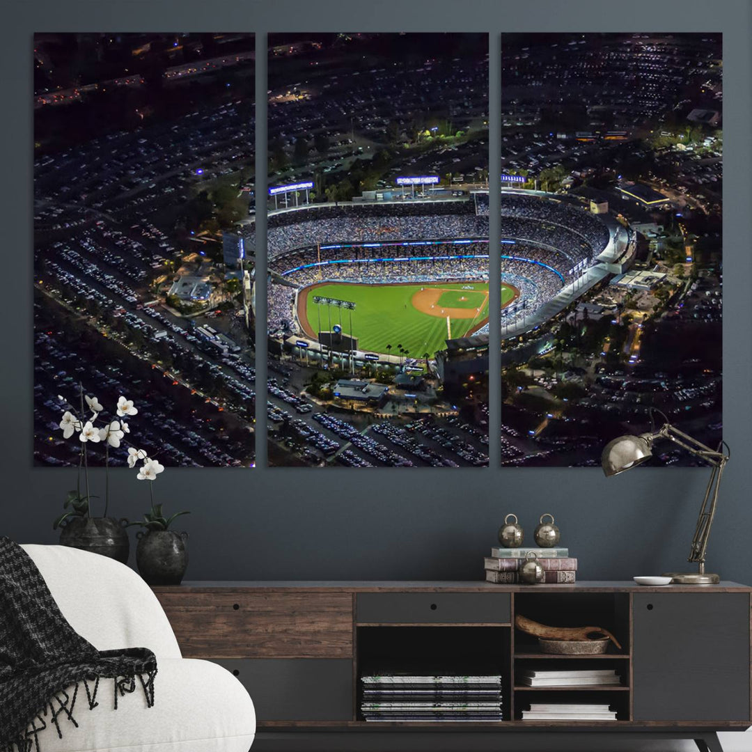 A large Los Angeles Dodgers print of Dodger Stadium at night is displayed near a window.