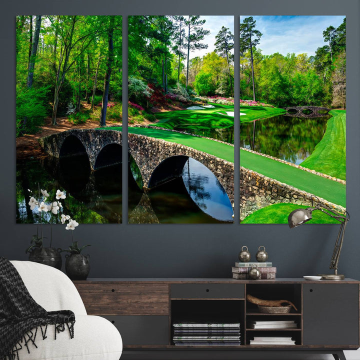 The wall art from Augusta National Golf Club showcases a panoramic bridge set against rich, lush greenery on a framed triptych canvas.