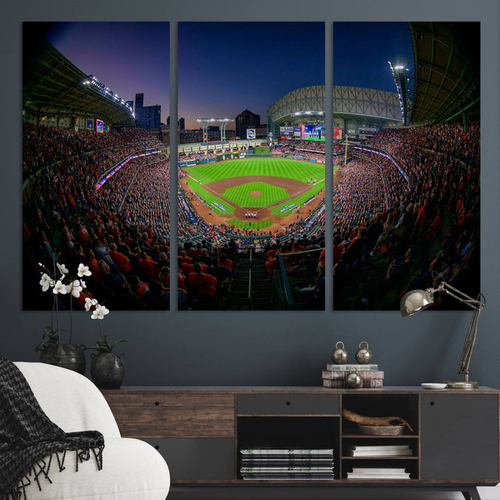 A canvas print of Houston Minute Maid Park at dusk is mounted on the wall.