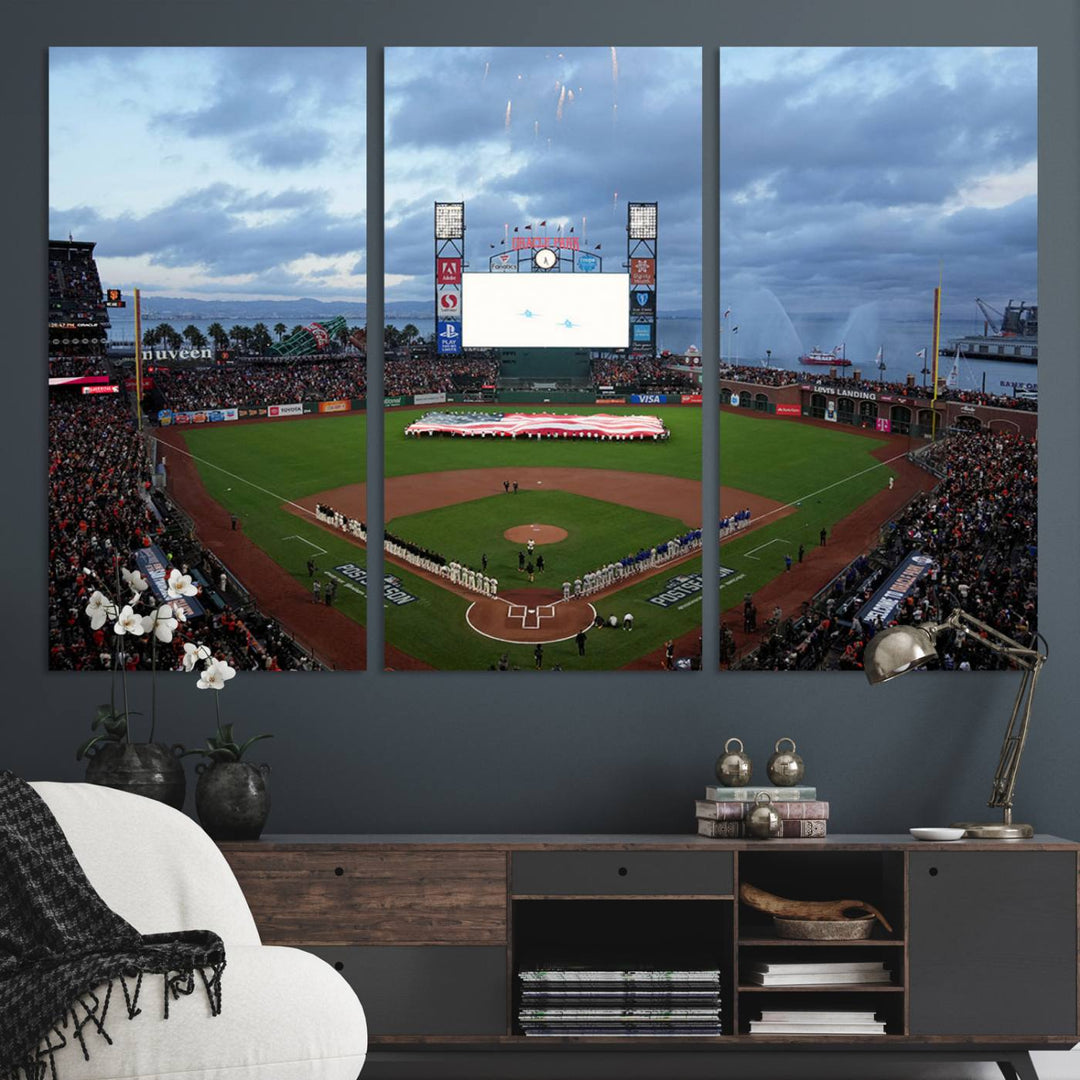 This framed 3-panel canvas MLB wall art features a giant flag and fans under a cloudy sky at Oracle Park.