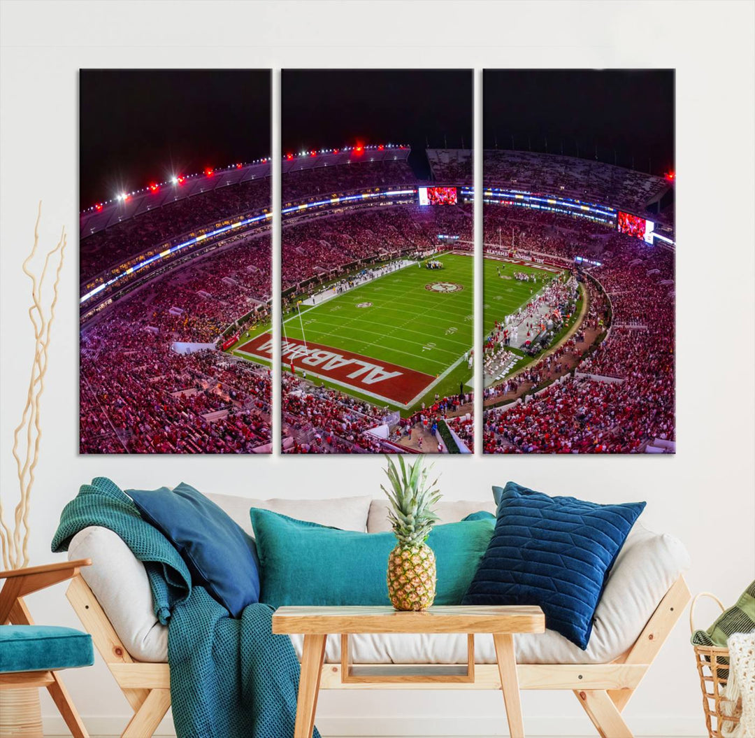 The living room features a Bryant-Denny Stadium Night Game Triple Canvas Wall Art.