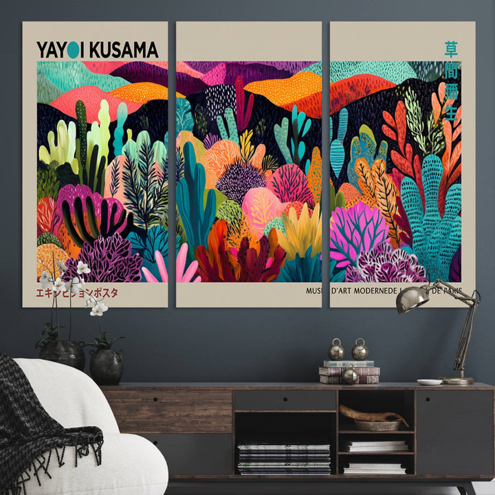 The framed Yayoi Kusama wall art adds vibrancy above the blue couch.