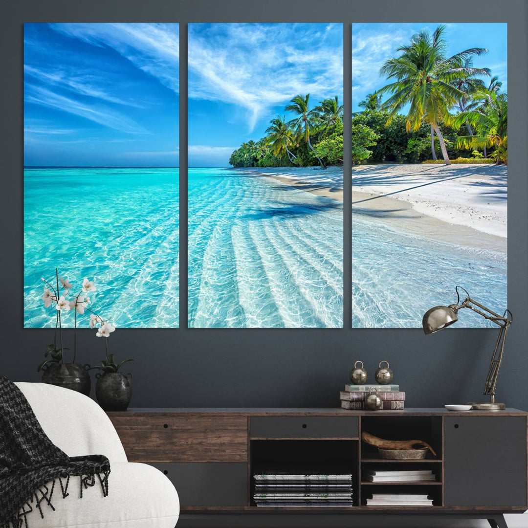 The Tropical Beach Wall Art Canvas Print showcases a serene ocean landscape with crystal clear turquoise water and palm trees, beautifully enhancing the coastal decor.