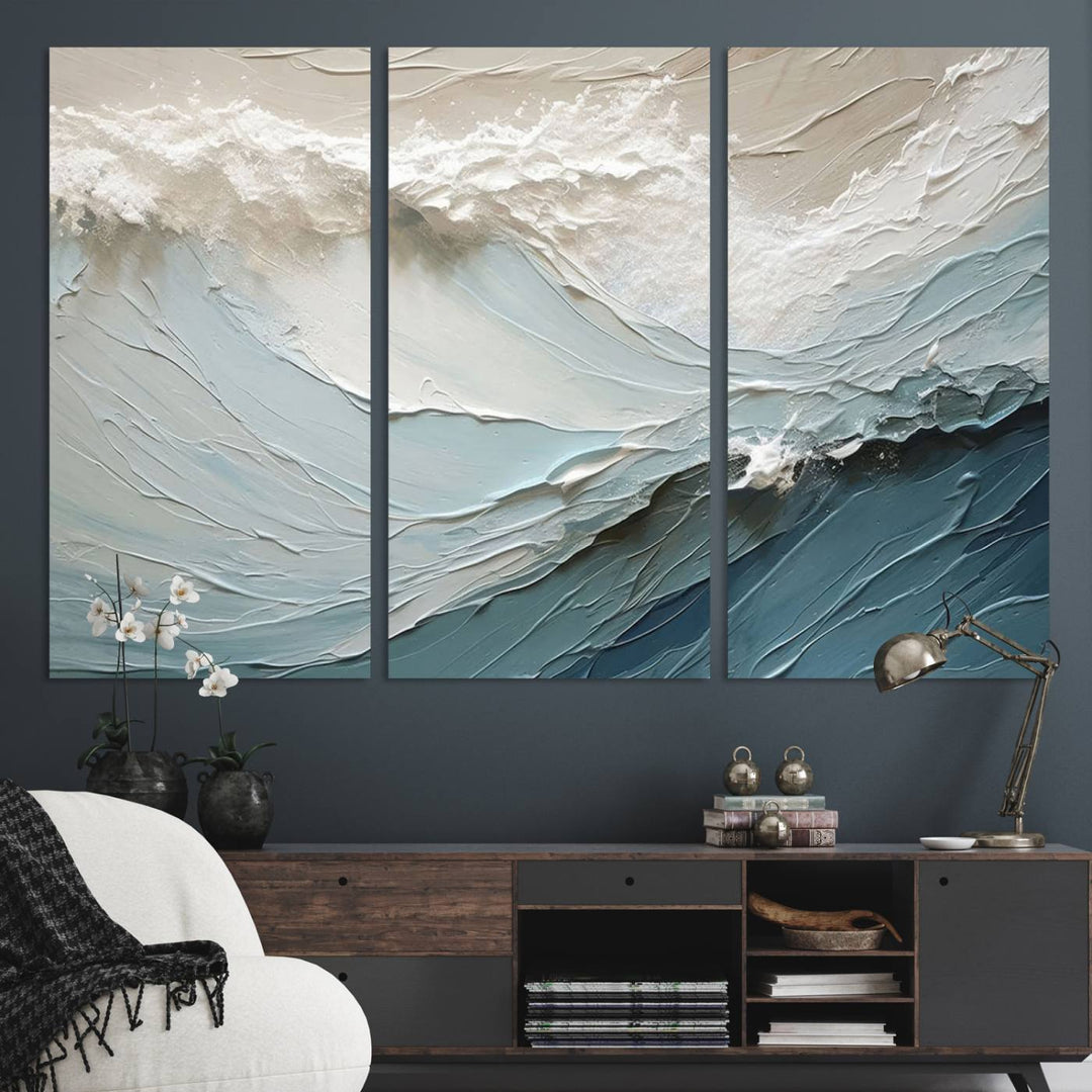 The Waves Abstract Wall Art Print, a captivating piece of modern framed abstract canvas, beautifully decorates the wall. This abstract painting is designed to enhance your living room decor and offers the convenience of being ready to hang.