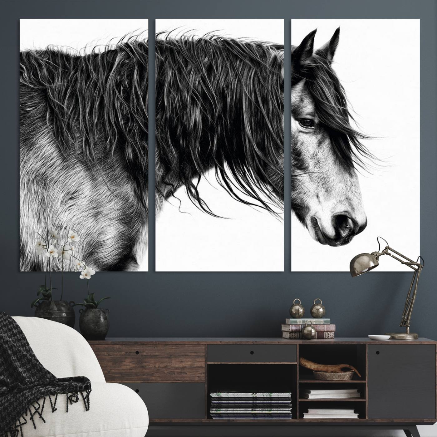 A stunning black-and-white portrait of a horse with a flowing mane, captured in dramatic detail and emotion.