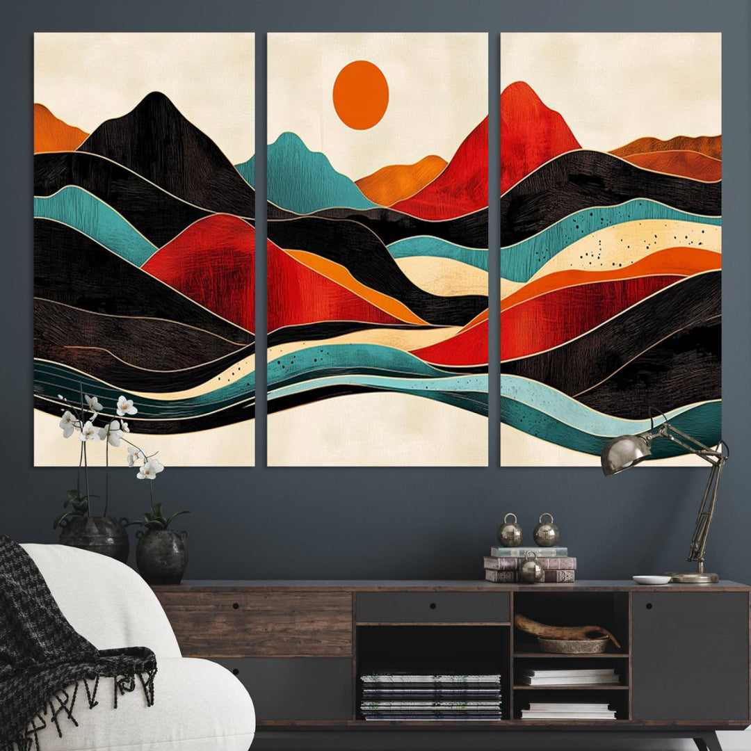 The Colorful Western Triptych Canvas features a vibrant mountain and sun design, making it perfect for modern kitchens or log cabin walls.