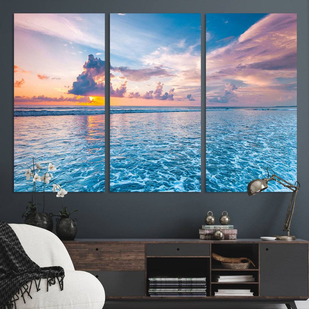 An Ocean Sunset Canvas Wall Art depicting a vibrant sky and rolling waves.