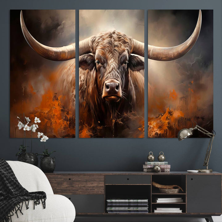 A Highland Bull with striking horns is depicted in a fiery abstract style on a ready-to-hang wall art canvas, evoking strength.